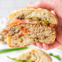 hand holding sliced open turkey white bean burger