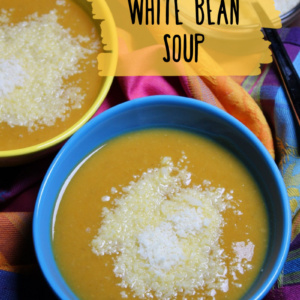 tuscan pumpkin white bean soup in a blue bowl