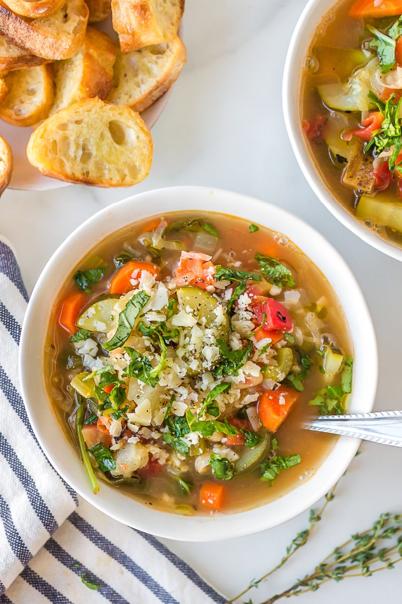 Premium Photo  Healthy homemade vegetable soup fresh and ready to eat - on  wooden table, parmesan cheese