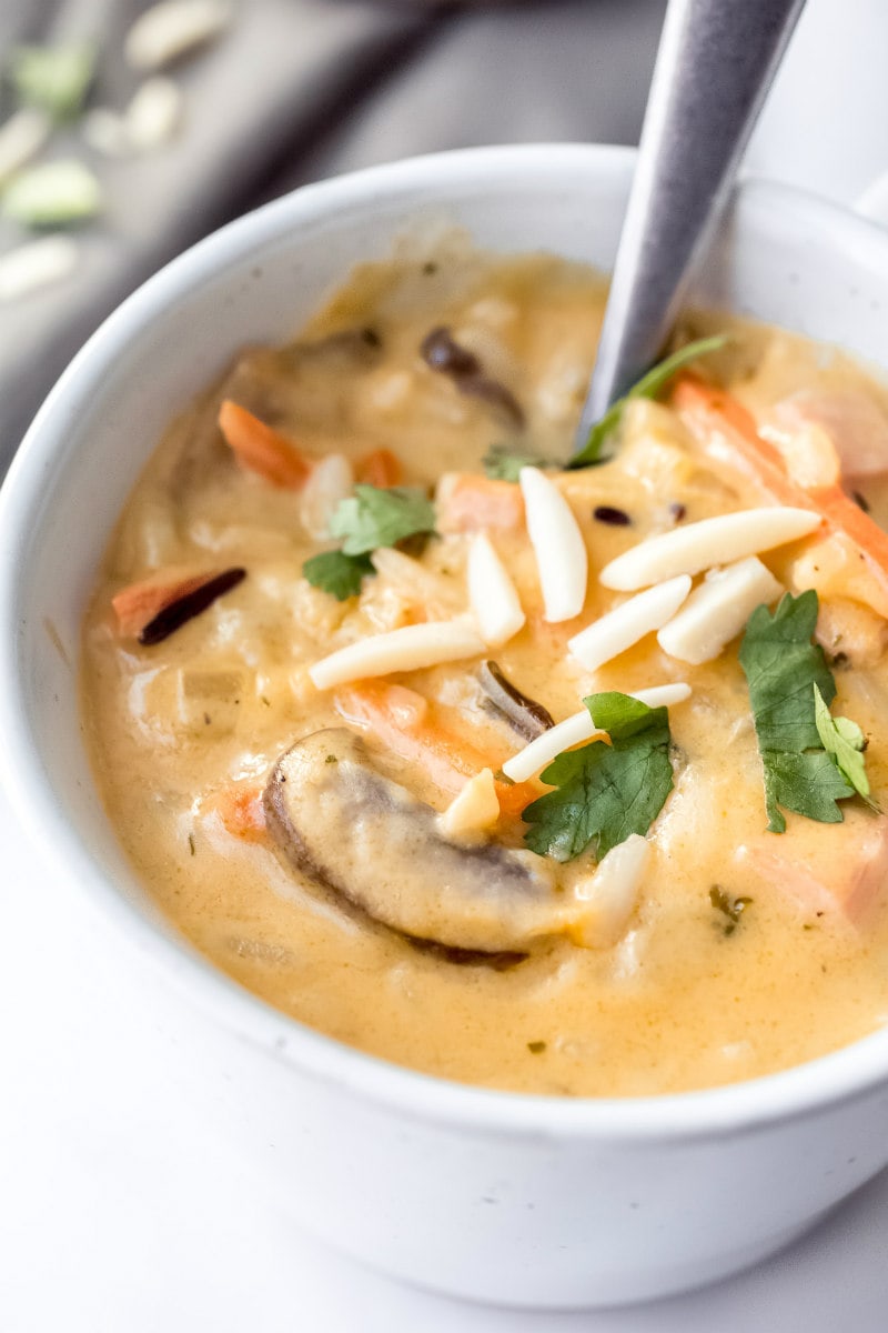 bowl of Wild Rice Soup garnished with almonds