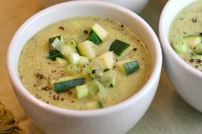 zucchini and rosemary soup in a bowl