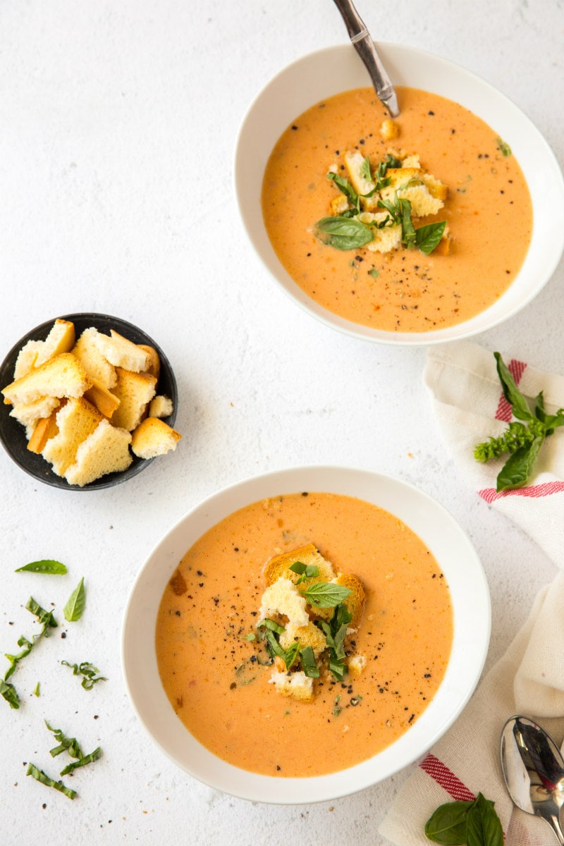 Herbed Tomato Soup in bowls garnished with croutons
