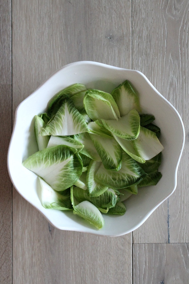 Apple Endive Salad recipe from RecipeGirl.com #apple #endive #salad #recipe #RecipeGirl Bowl of Endive leaves