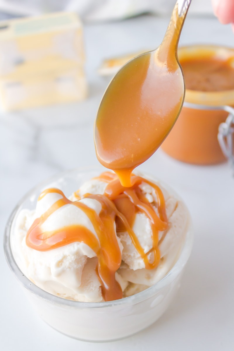 drizzling caramel over ice cream