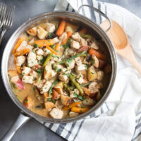 pan of chicken stew with balsamic roasted vegetables