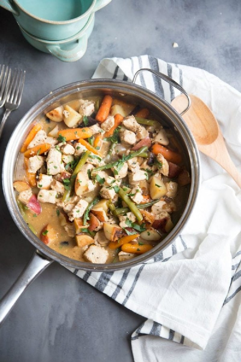 pan of chicken stew with balsamic roasted vegetables