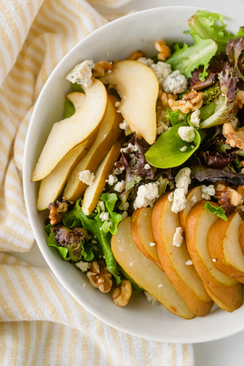 pear walnut and blue cheese salad in bowl
