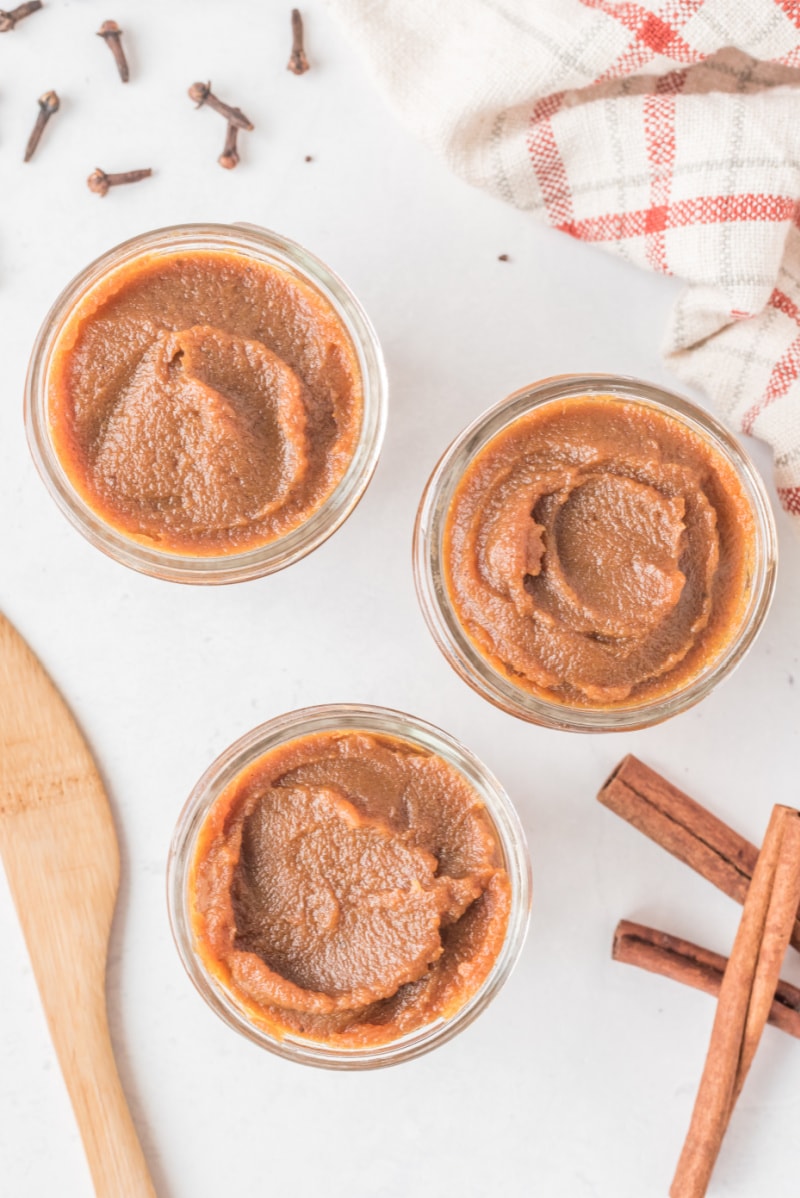 overhead shot of 3 jars pumpkin butter