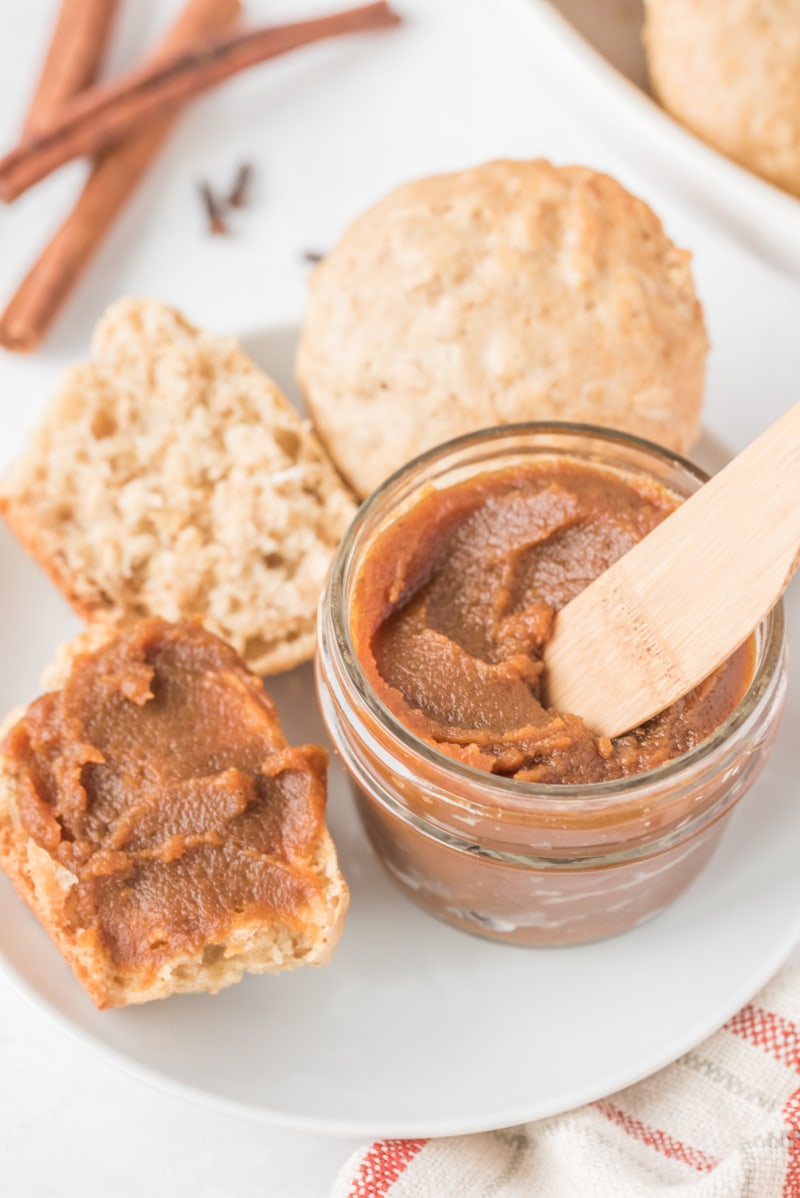 pumpkin butter in jar and on biscuits