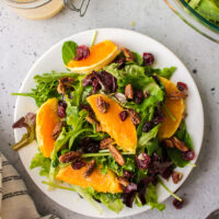 plate serving of salad with citrus vinaigrette