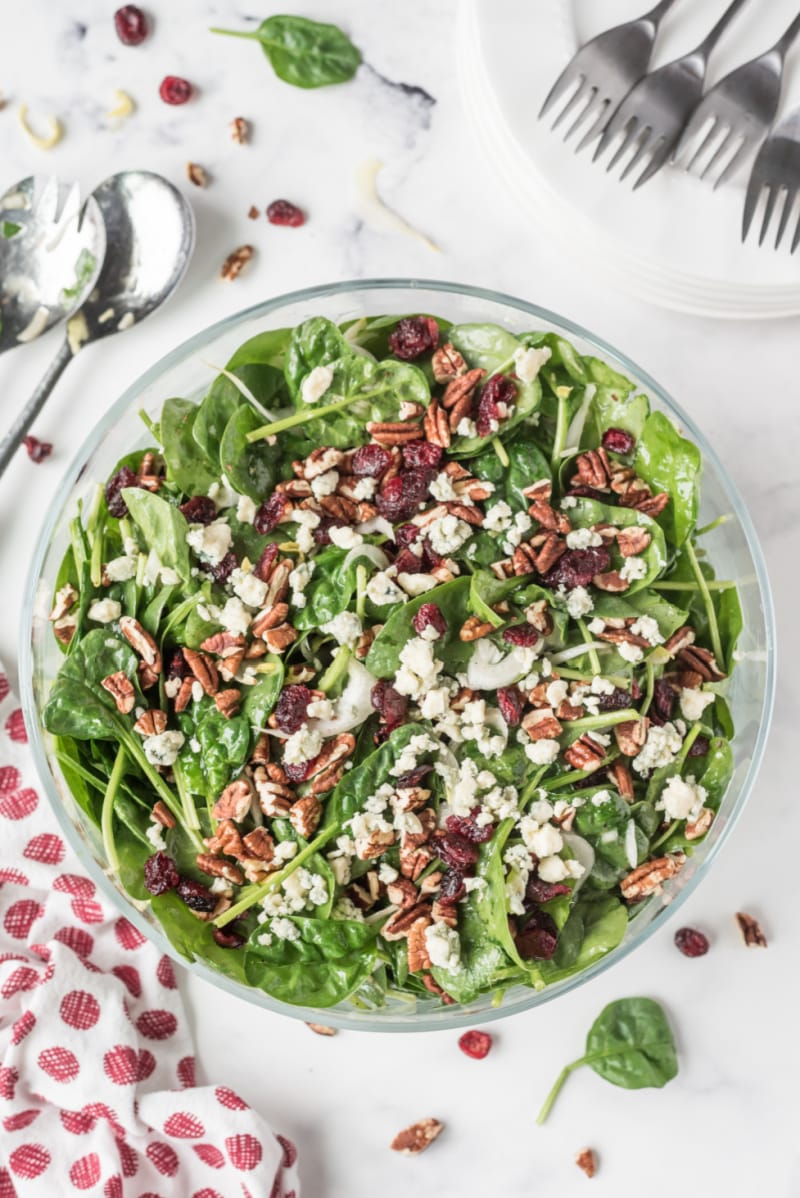 Spinach and Endive Salad with Blue Cheese and Pecans in a bowl