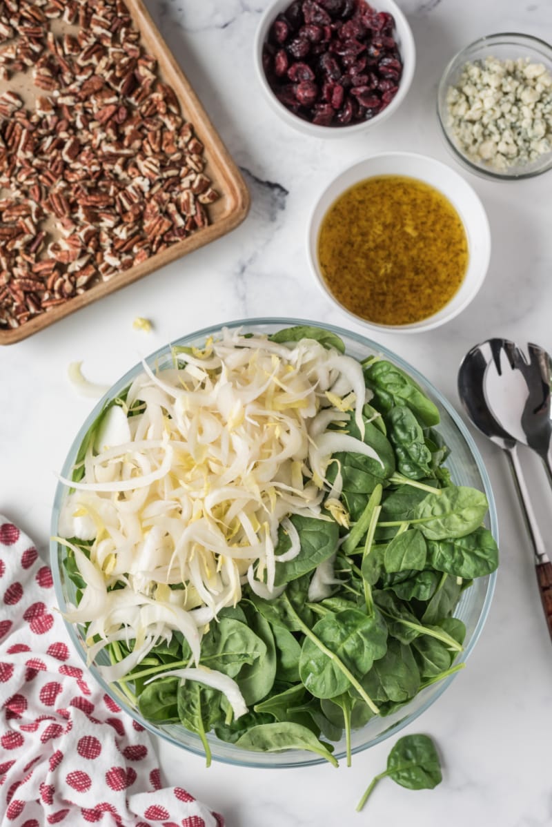 ingredients displayed for making Spinach and Endive Salad with Blue Cheese and Pecans
