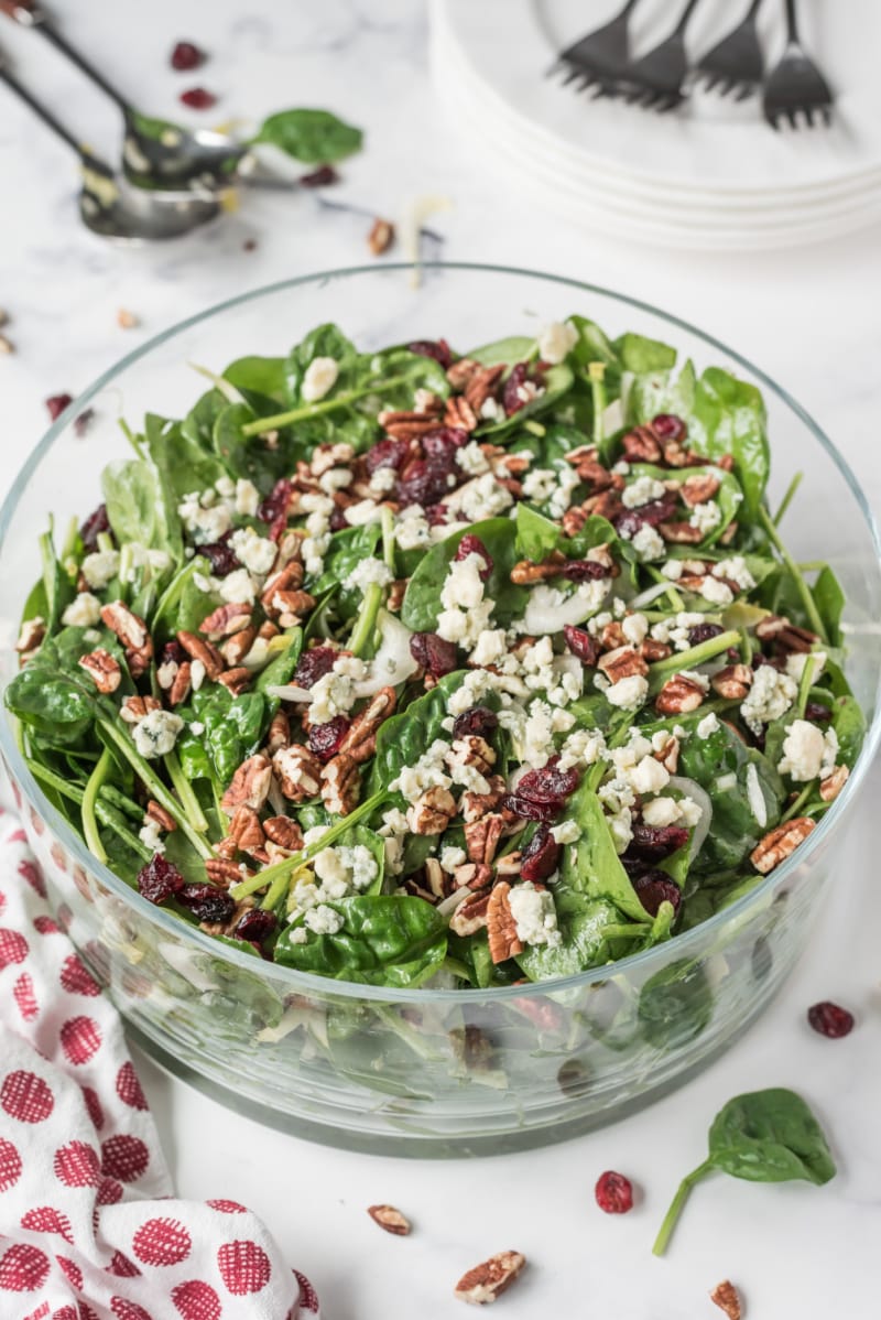 Spinach and Endive Salad with Blue Cheese and Pecans in a bowl