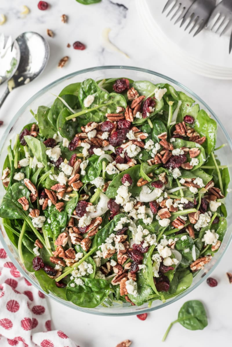 Spinach and Endive Salad with Blue Cheese and Pecans in a bowl