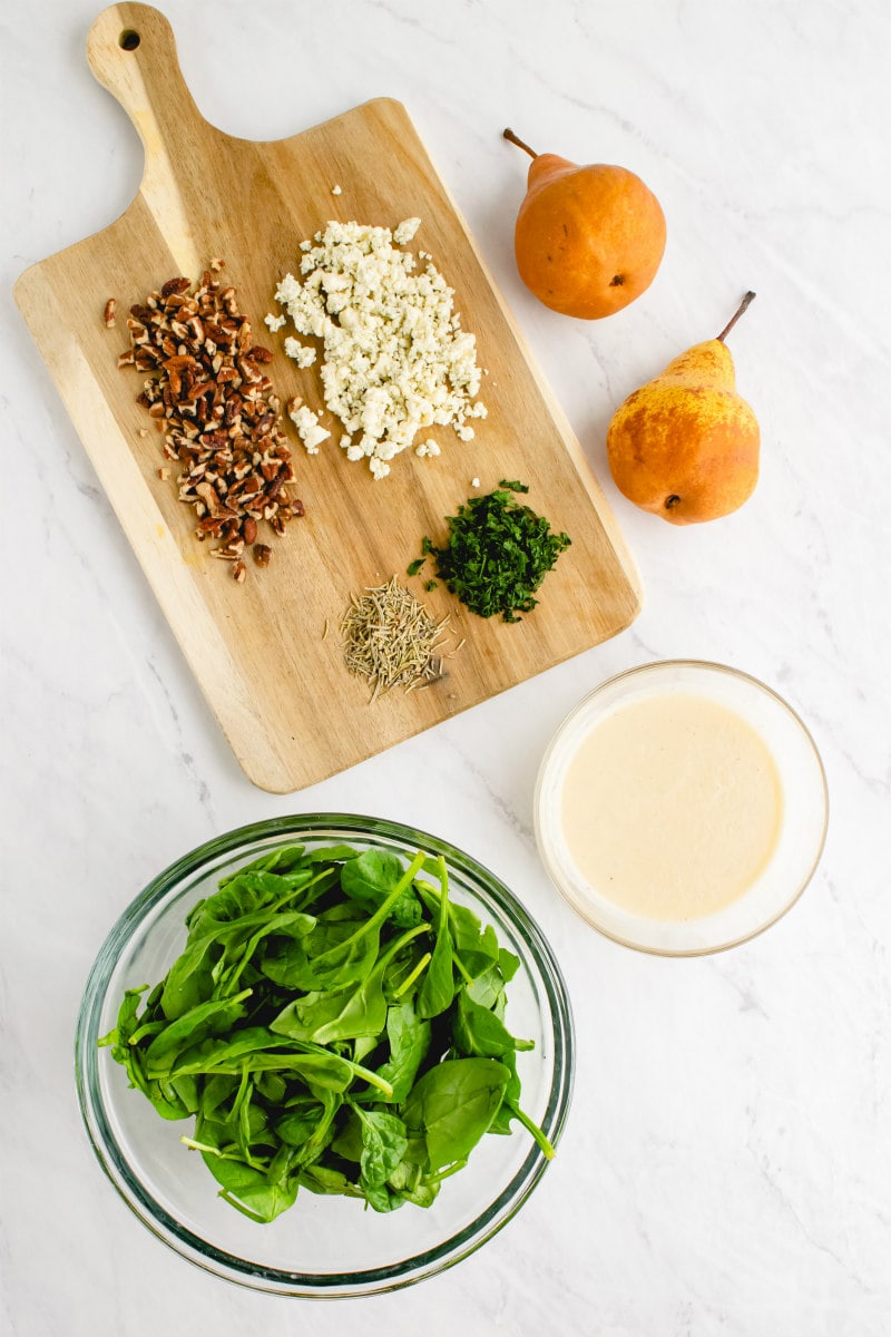 ingredients displayed for spinach and pear salad