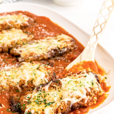 veal parmesan on a serving platter