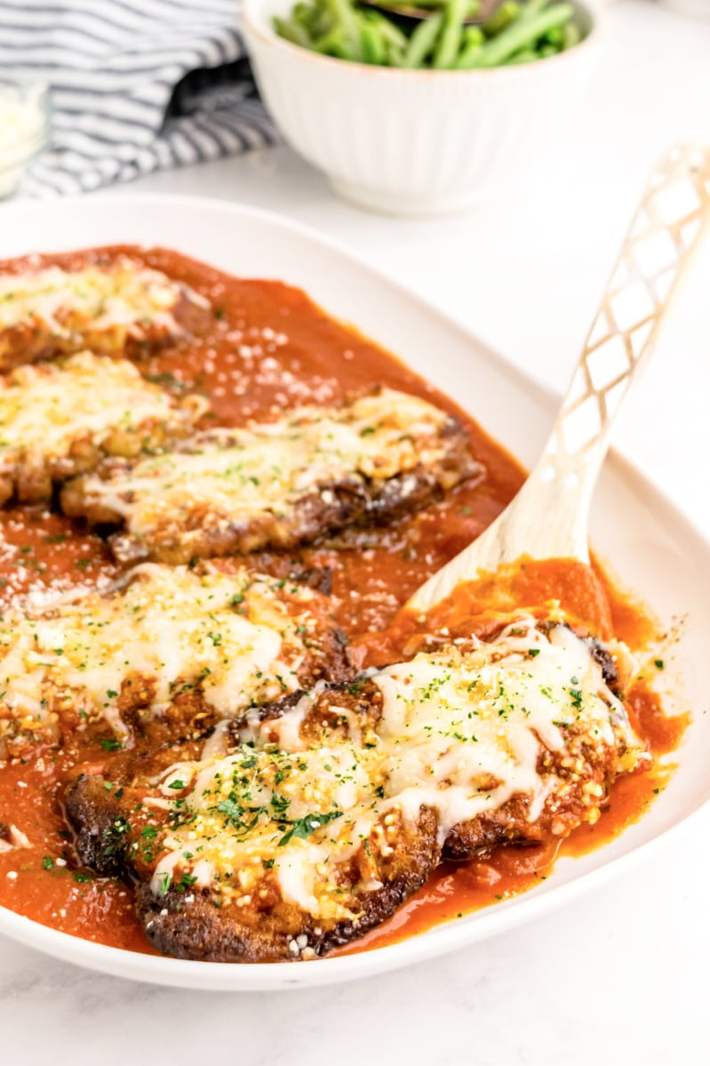 veal parmesan on a serving platter