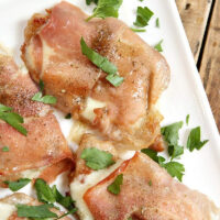 veal saltimbocca on a white plate