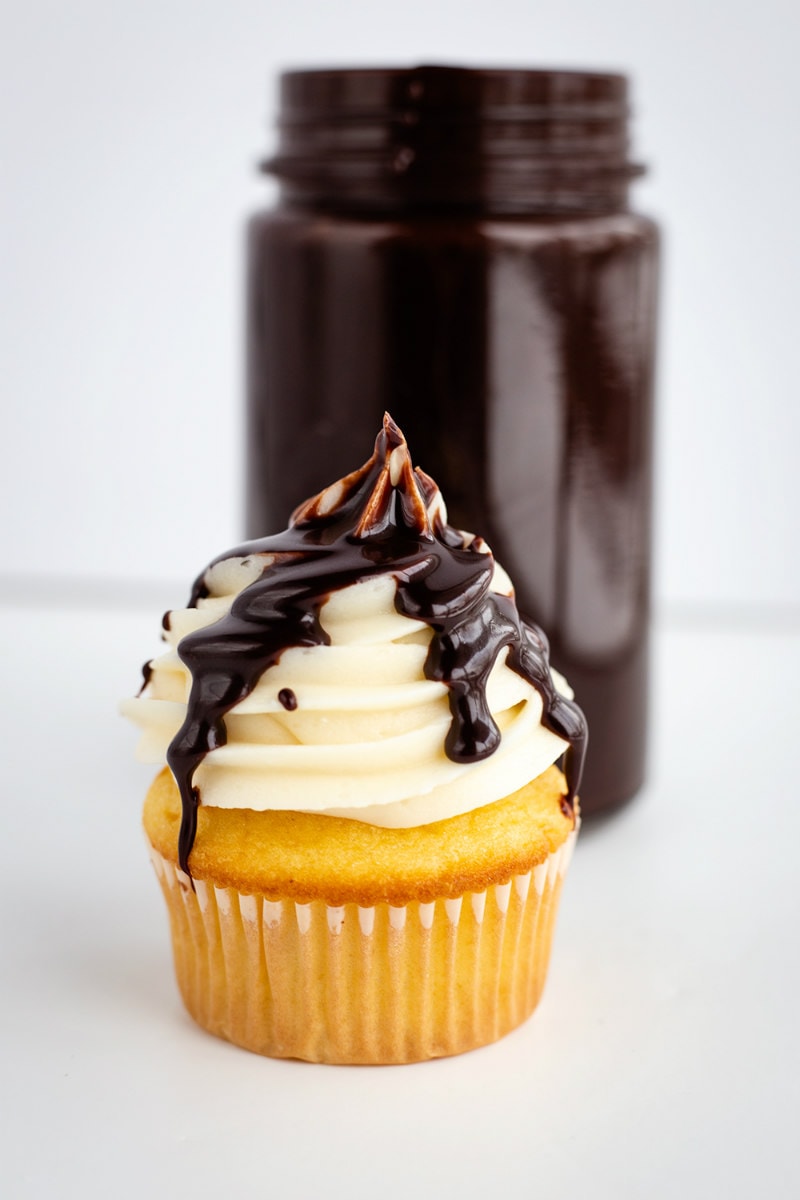 Chocolate Sauce drizzled over a cupcake