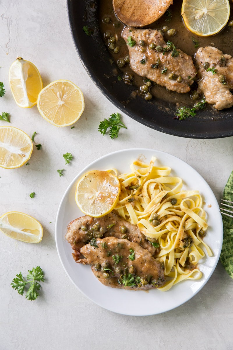 Veal Piccata recipe from RecipeGirl.com #veal #piccata #classic #italian #dinner #recipe #RecipeGirl Veal Piccata served with pasta