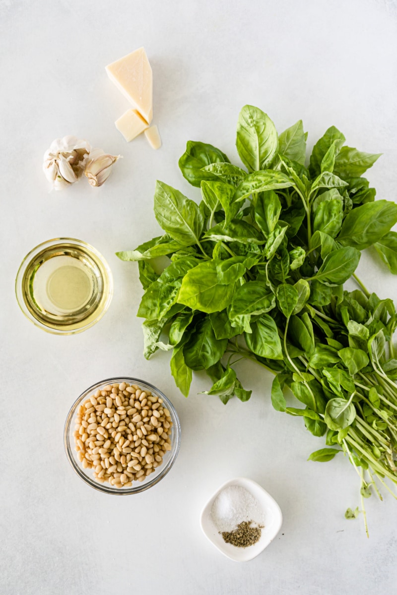 ingredients displayed for making classic pesto sauce