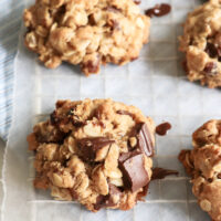 healthier chocolate chip oatmeal cookies on a cooling rack