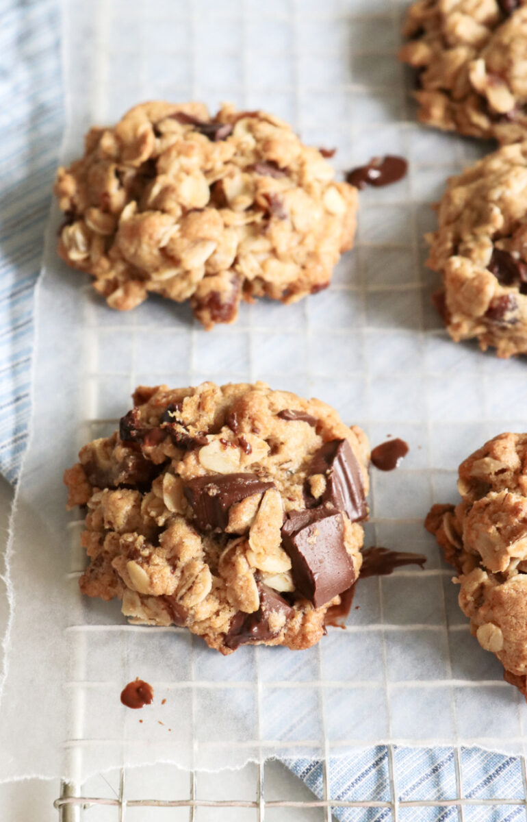 healthier chocolate chip oatmeal cookies on a cooling rack