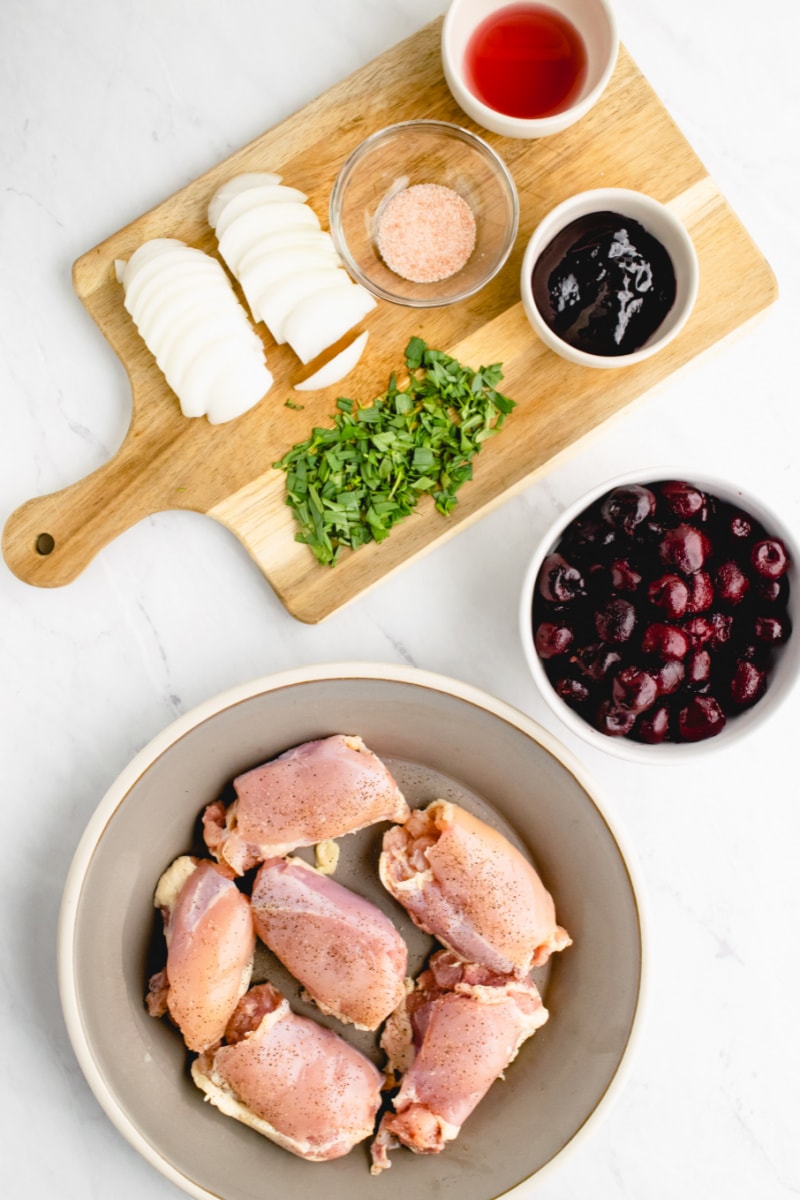 ingredients for sauteed chicken with cherries displayed