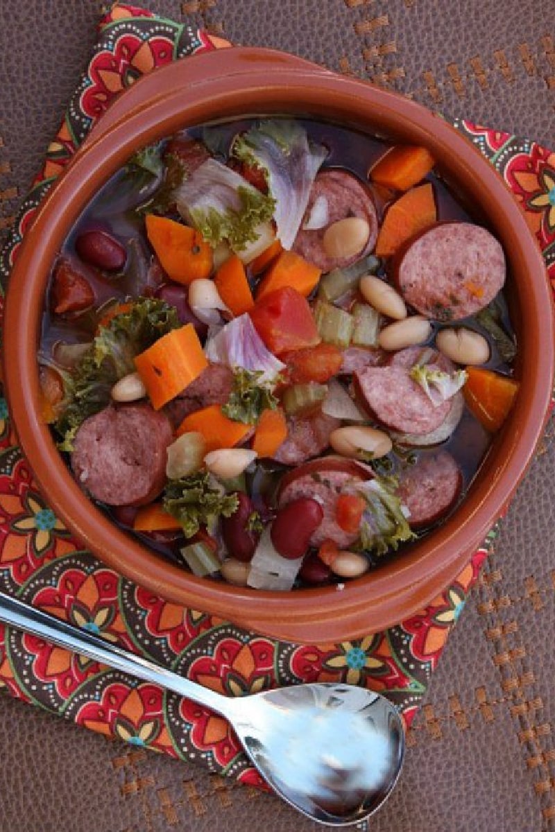 bowl of slow cooker tuscan sausage and bean soup