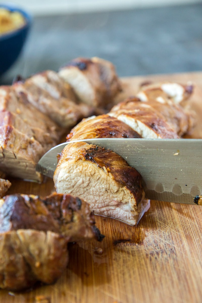 slicing teriyaki pork