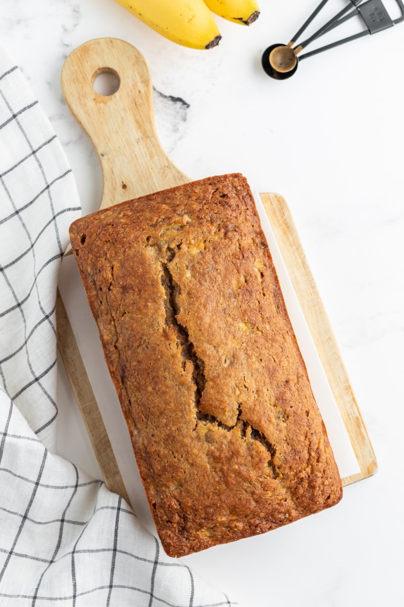 loaf of banana bread on a cutting board