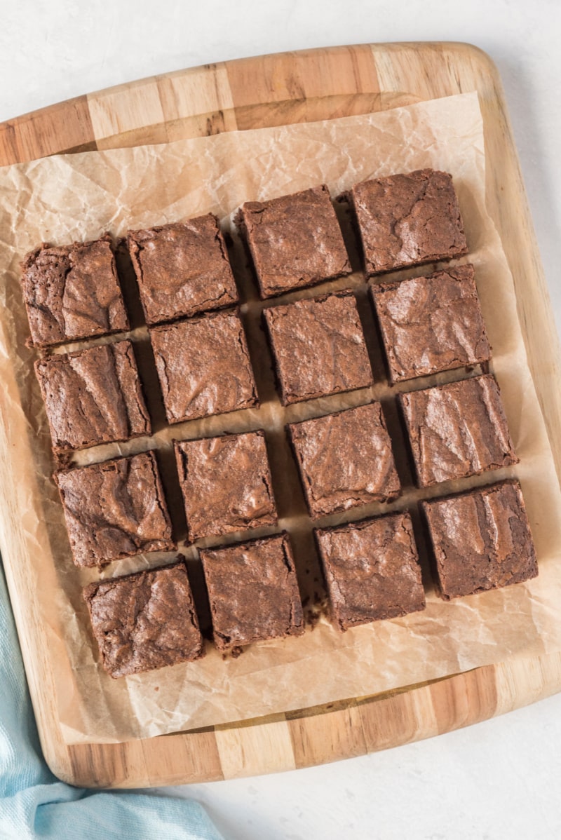 brownies cut into squares on cutting board