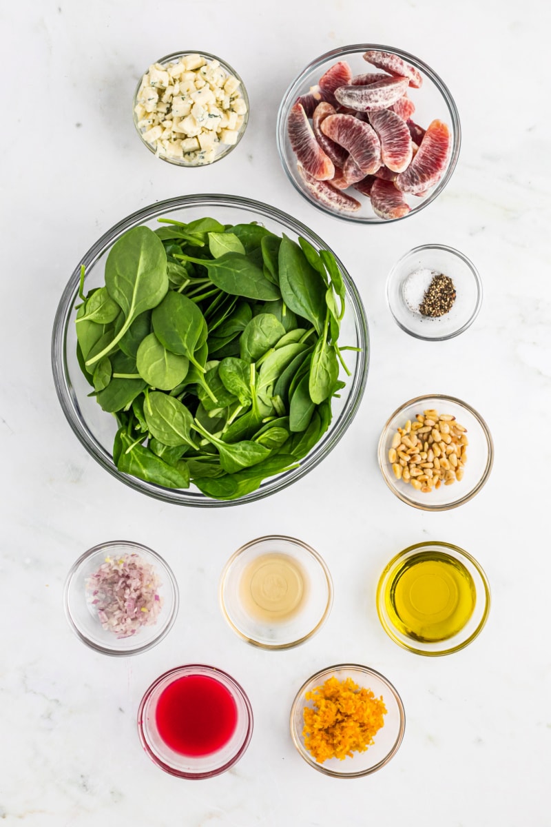 ingredients displayed for making blood orange spinach salad