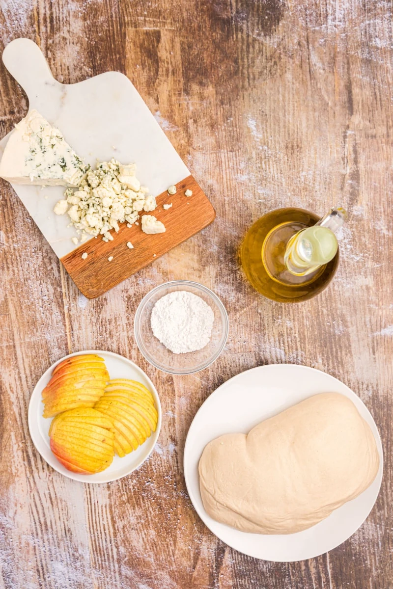 ingredients displayed for making blue cheese and pear pizza