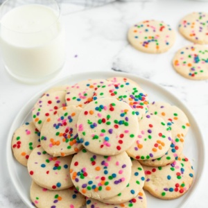 celebration cookies on a white plate