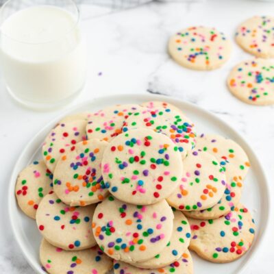 celebration cookies on a white plate