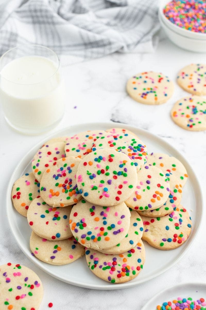 celebration cookies on a white plate