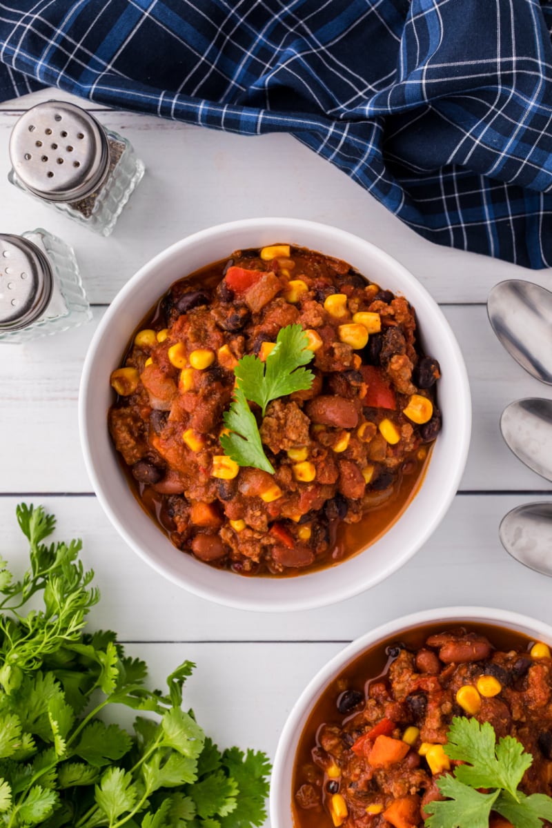 servings of confetti chili in two white bowls