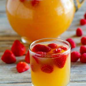 fruity vodka spritzers glass and pitcher full