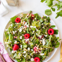 plate of goat cheese salad with raspberry vinaigrette