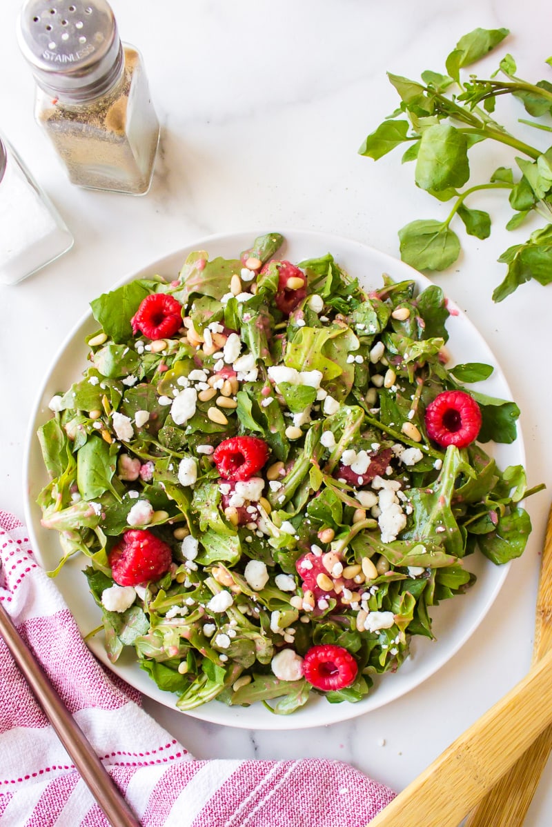 plate of goat cheese salad with raspberry vinaigrette