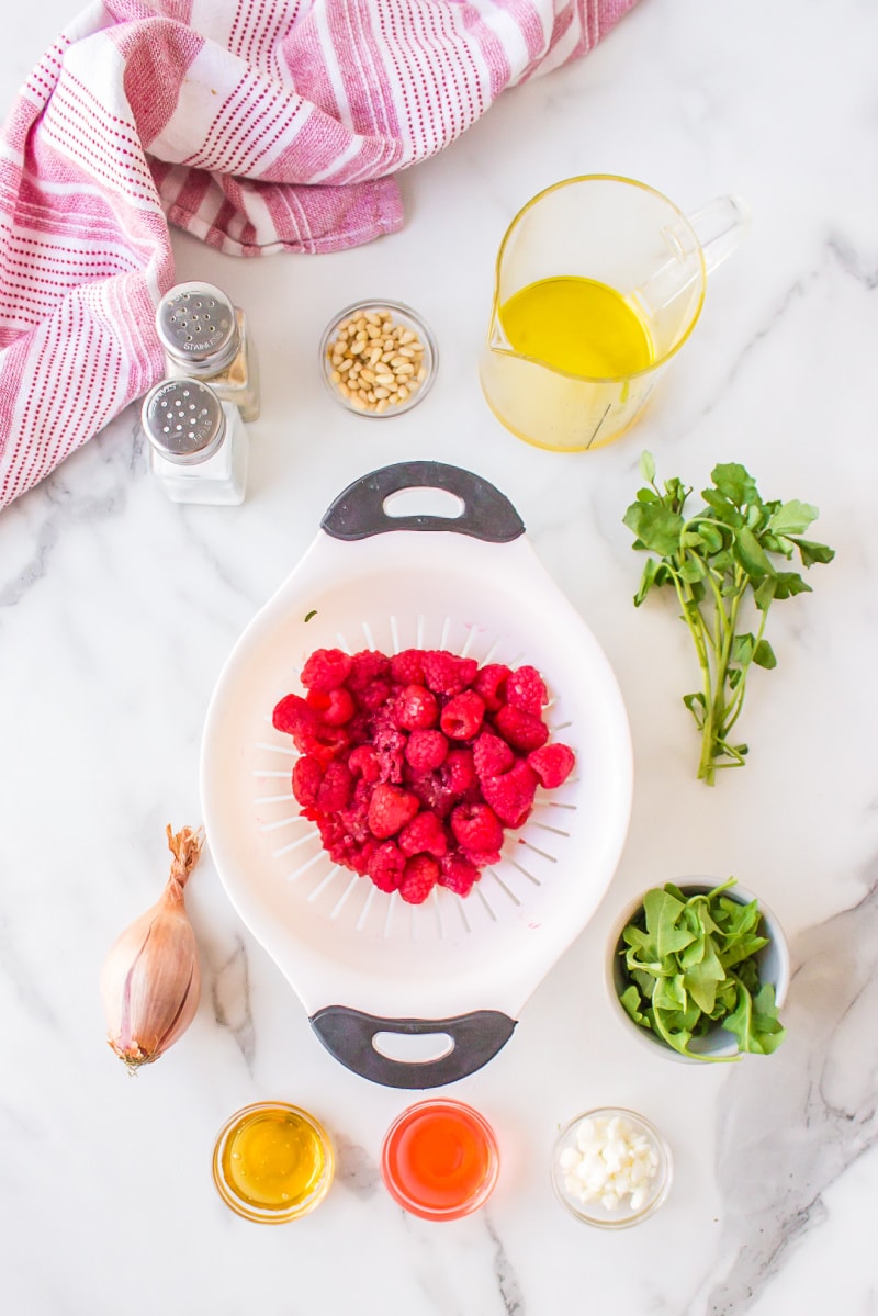 ingredients displayed for making goat cheese salad with raspberry vinaigrette