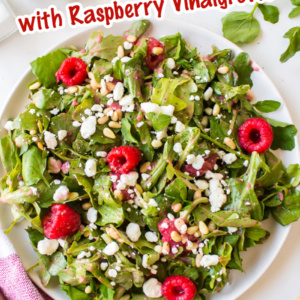 pinterest image for goat cheese salad with raspberry vinaigrette