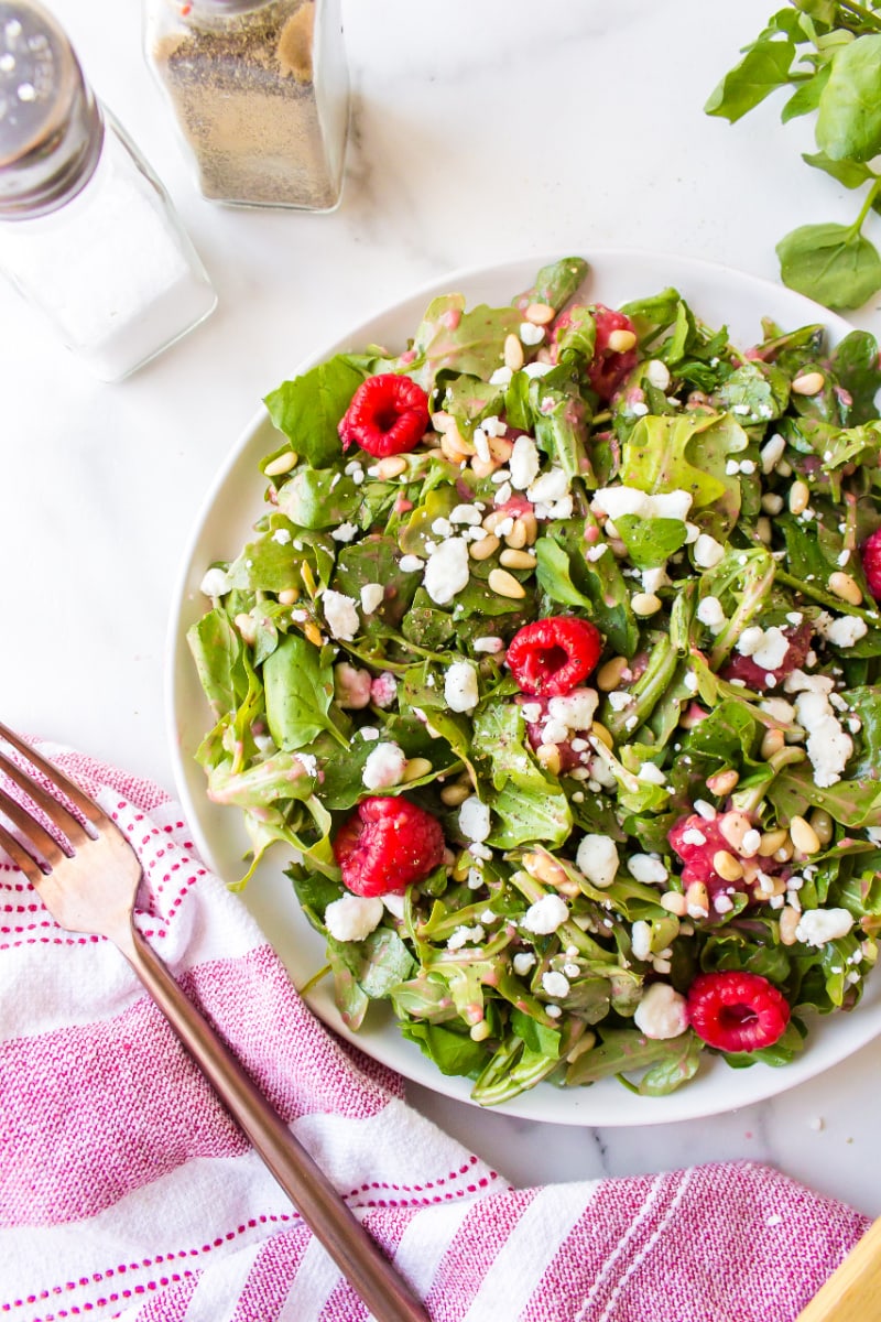 plate of goat cheese salad with raspberry vinaigrette