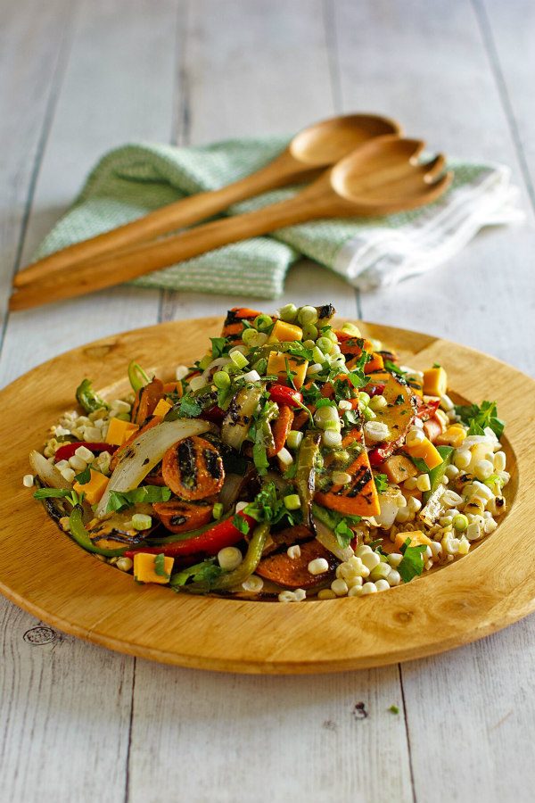 Grilled Corn Dog Salad in a woden bowl