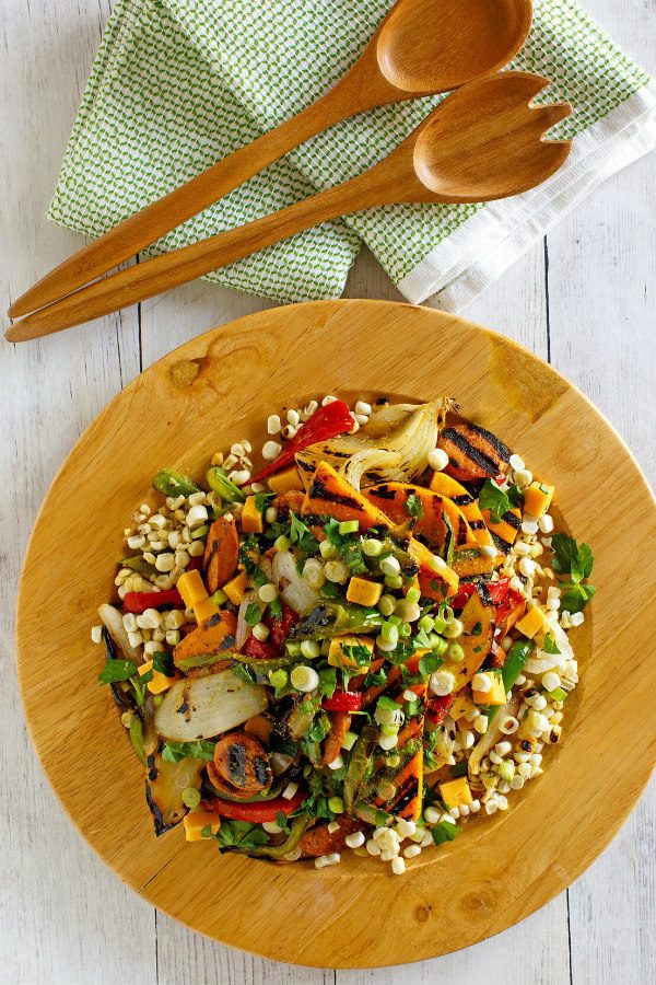 Grilled Corn Dog Salad in a wooden bowl