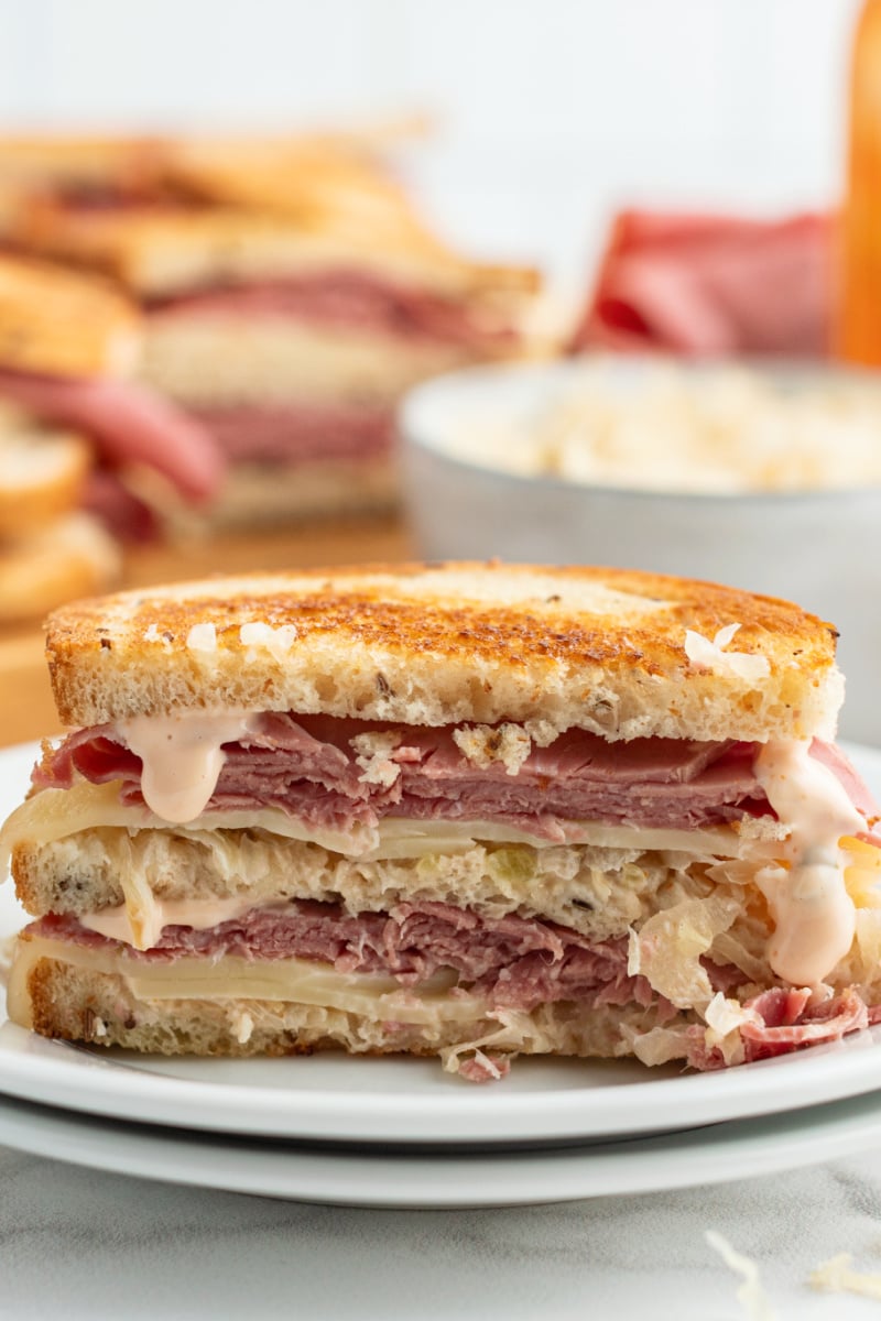 reuben sandwich on a white plate