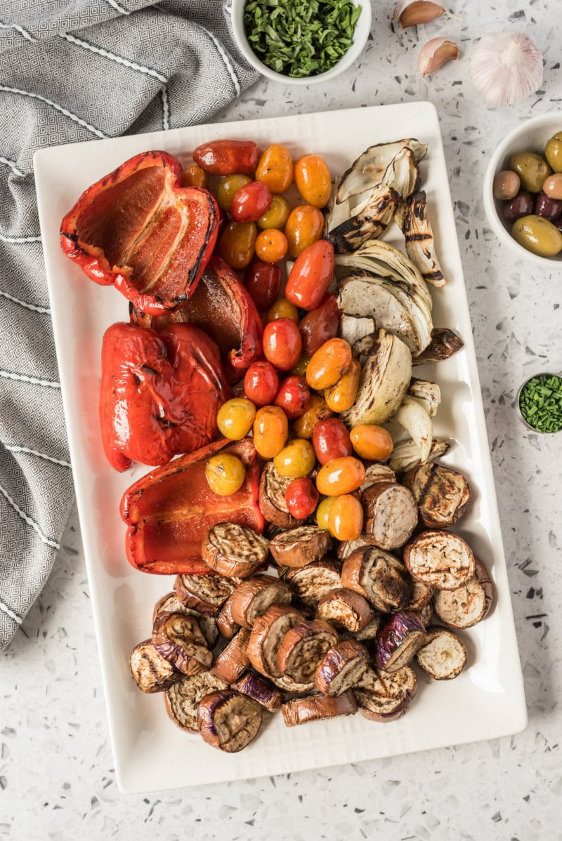 overhead shot of grilled vegetables on a rectangular white platter