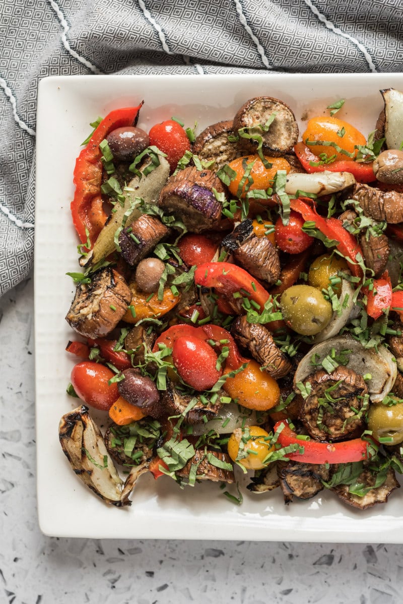 grilled vegetable salad on a rectangular white platter