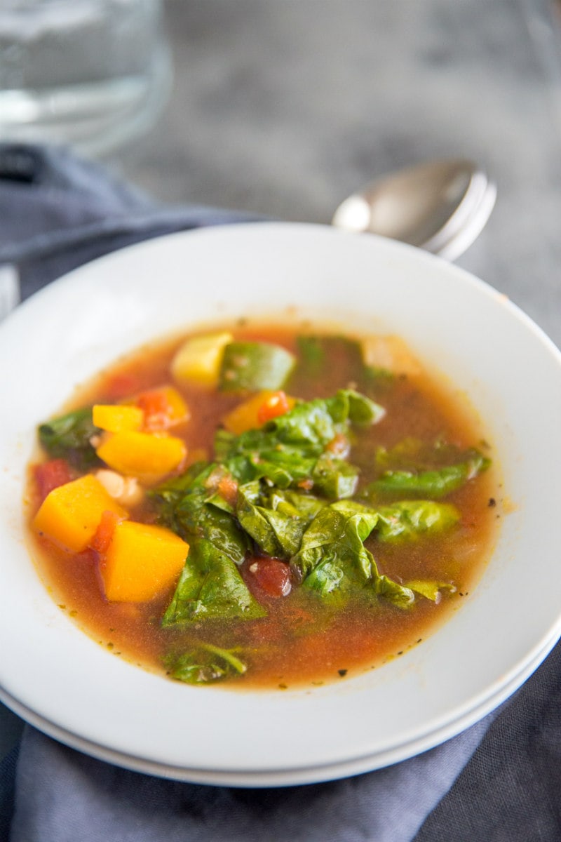Easy Italian Vegetable Soup recipe from RecipeGirl.com #easy #italian #vegetable #soup #recipe #RecipeGirl Bowl of easy italian vegetable soup